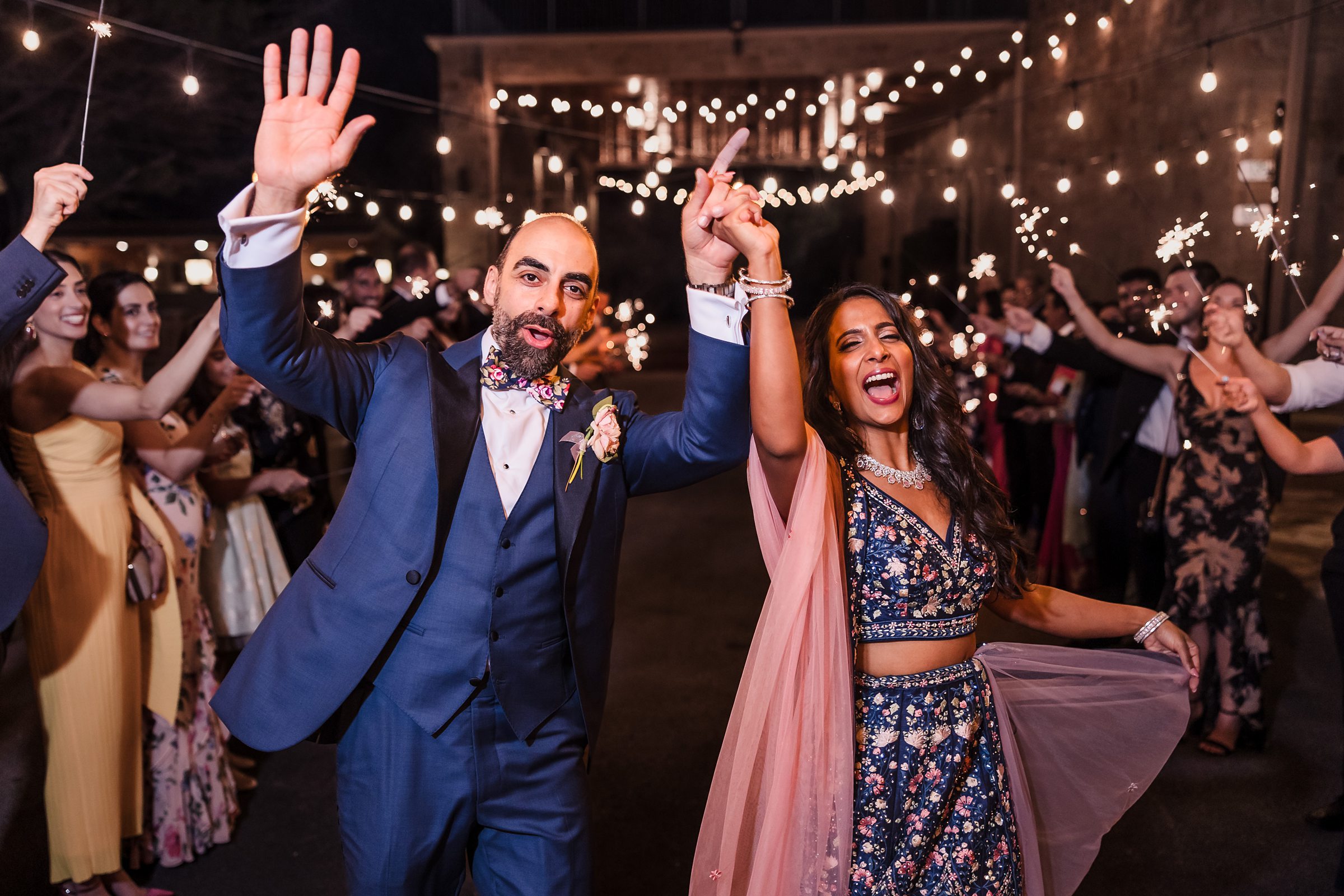 Bride and groom celebrate during a wedding at Shiraz Garden in Bastrop, Texas.